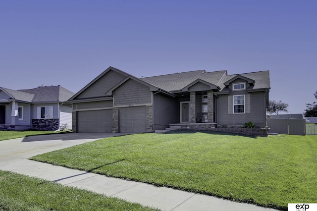 6015 S 193rd St, Omaha, NE 68135 - view of front of house featuring driveway, a garage, stone siding, and roof with shingles