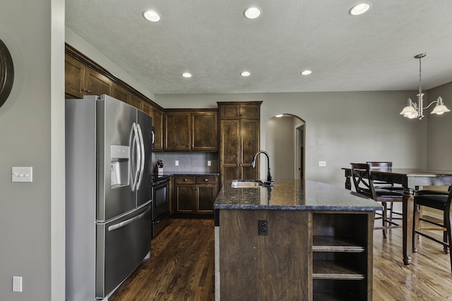 6015 S 193rd St, Omaha, NE 68135 - kitchen featuring stainless steel fridge with ice dispenser, arched walkways, black range with electric stovetop, dark brown cabinetry, and dark wood-style flooring