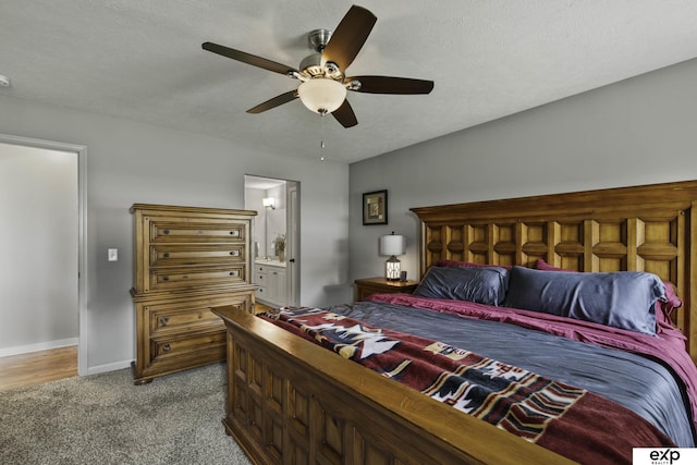 6015 S 193rd St, Omaha, NE 68135 - carpeted bedroom with ensuite bathroom, ceiling fan, and a textured ceiling