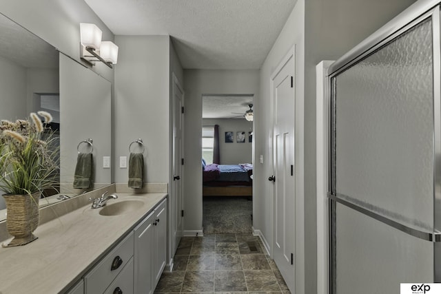 6015 S 193rd St, Omaha, NE 68135 - full bathroom featuring connected bathroom, a textured ceiling, vanity, ceiling fan, and a stall shower