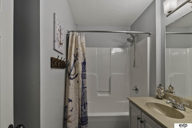 6015 S 193rd St, Omaha, NE 68135 - full bath featuring a textured ceiling, shower / tub combo, and vanity