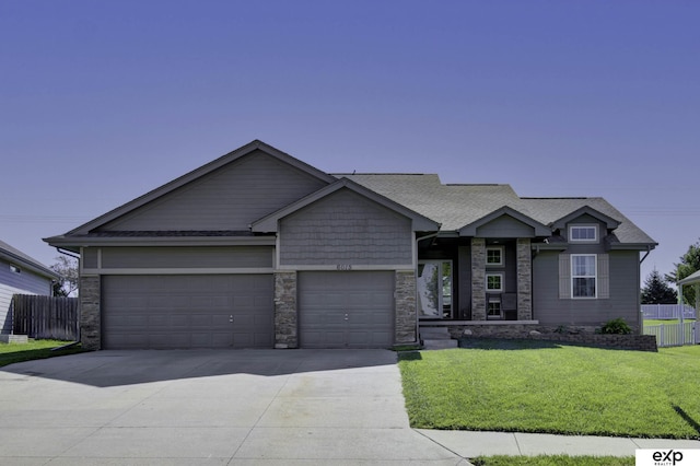 6015 S 193rd St, Omaha, NE 68135 - view of front of property with concrete driveway, a garage, a shingled roof, and stone siding