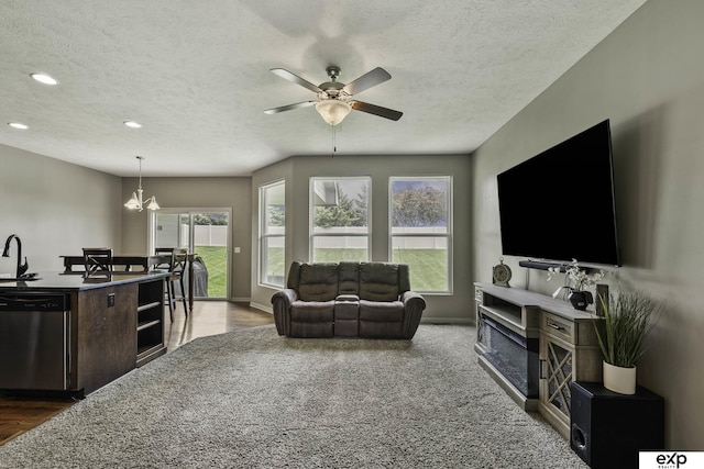 6015 S 193rd St, Omaha, NE 68135 - living room with a textured ceiling, ceiling fan, and recessed lighting