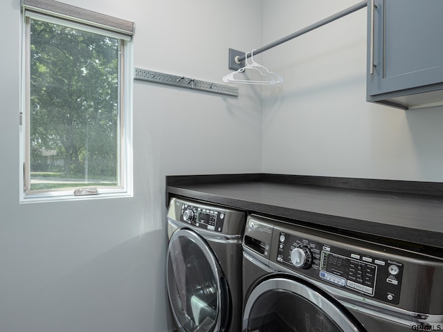201 Bellevue Blvd N, Bellevue, NE 68005 - washroom with cabinet space and washer and clothes dryer