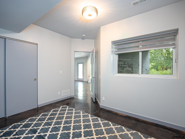 201 Bellevue Blvd N, Bellevue, NE 68005 - unfurnished bedroom featuring baseboards and a closet
