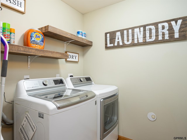 15413 Bondesson St, Bennington, NE 68007 - laundry area with washer and clothes dryer