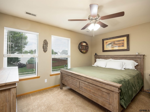 15413 Bondesson St, Bennington, NE 68007 - bedroom featuring carpet, multiple windows, and a ceiling fan
