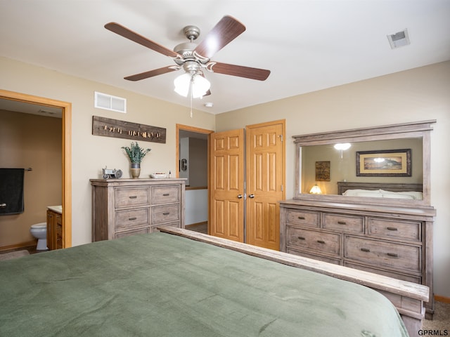 15413 Bondesson St, Bennington, NE 68007 - bedroom featuring ensuite bathroom, ceiling fan, and carpet flooring