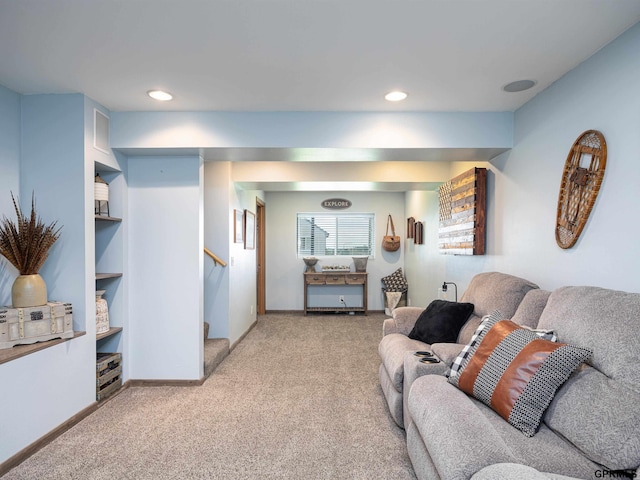 15413 Bondesson St, Bennington, NE 68007 - living area with light colored carpet, stairs, and recessed lighting