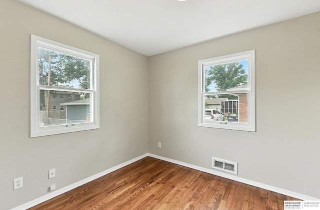 3207 S 121st St, Omaha, NE 68144 - spare room with plenty of natural light and wood finished floors