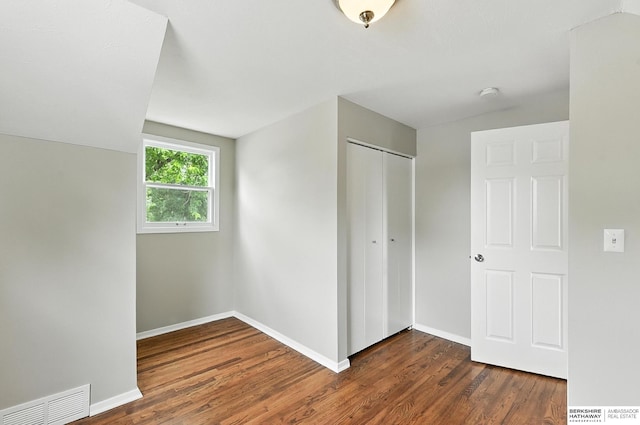 3207 S 121st St, Omaha, NE 68144 - unfurnished bedroom with wood finished floors and a closet