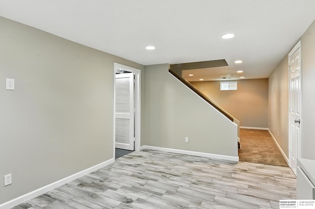 3207 S 121st St, Omaha, NE 68144 - basement with recessed lighting, wood finished floors, and stairway