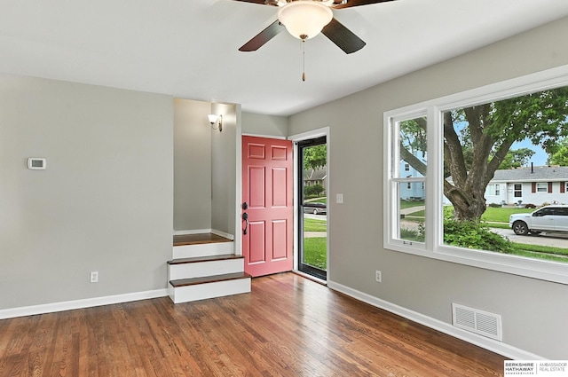 3207 S 121st St, Omaha, NE 68144 - entrance foyer with wood finished floors, ceiling fan, and stairs