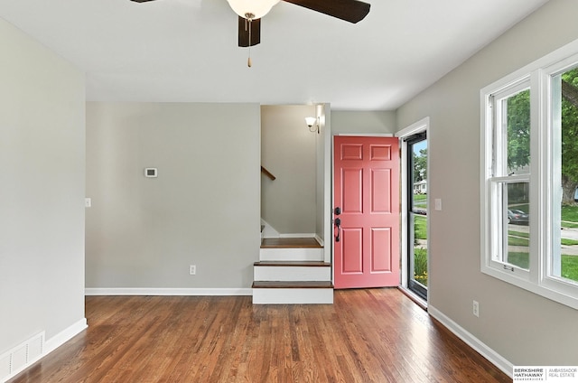 3207 S 121st St, Omaha, NE 68144 - entryway with wood finished floors, stairs, and ceiling fan