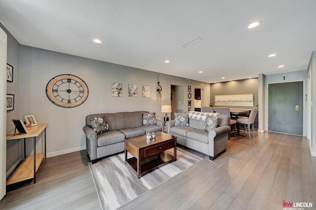 4000 S 56th St Unit 130C, Lincoln, NE 68516 - living area featuring wood finished floors and recessed lighting