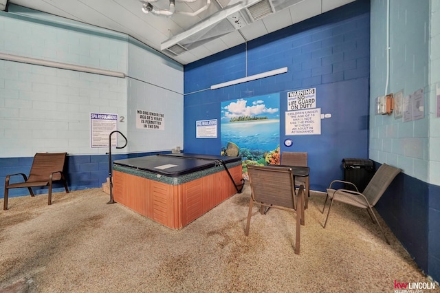 4000 S 56th St Unit 130C, Lincoln, NE 68516 - miscellaneous room with carpet floors and concrete block wall