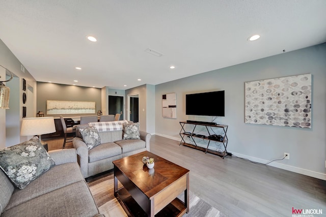 4000 S 56th St Unit 130C, Lincoln, NE 68516 - living area with light wood-style flooring and recessed lighting