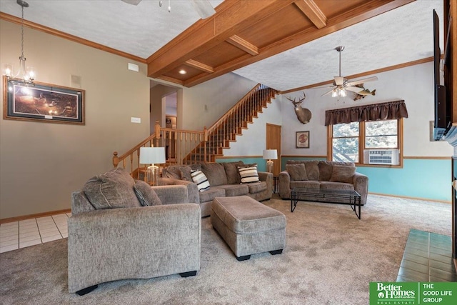 754 10th St, Syracuse, NE 68446 - carpeted living area with a ceiling fan, stairs, cooling unit, beamed ceiling, and crown molding