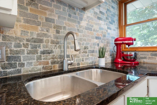 754 10th St, Syracuse, NE 68446 - kitchen view of white cabinets and dark stone counters