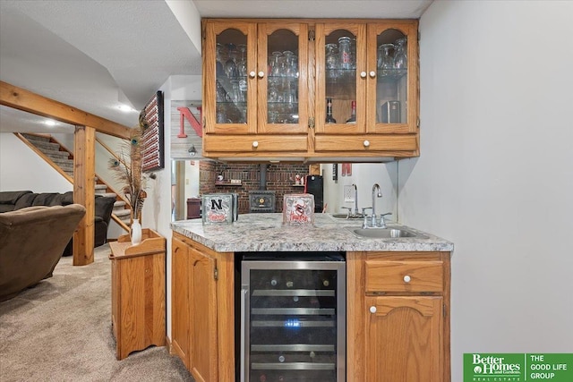 754 10th St, Syracuse, NE 68446 - indoor wet bar with beverage cooler, light carpet, and stairs