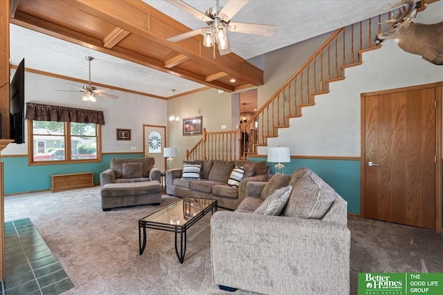 754 10th St, Syracuse, NE 68446 - living area featuring ceiling fan, carpet floors, stairs, beam ceiling, and crown molding