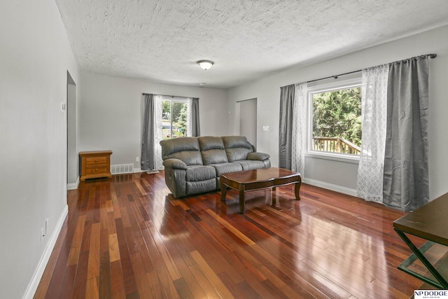 2705 Margo St, Bellevue, NE 68147 - living area with wood-type flooring and a textured ceiling