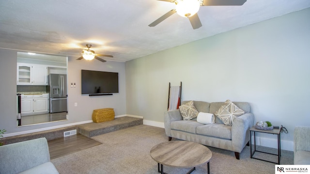 1757 N Linden St, Wahoo, NE 68066 - carpeted living room with a ceiling fan and baseboards