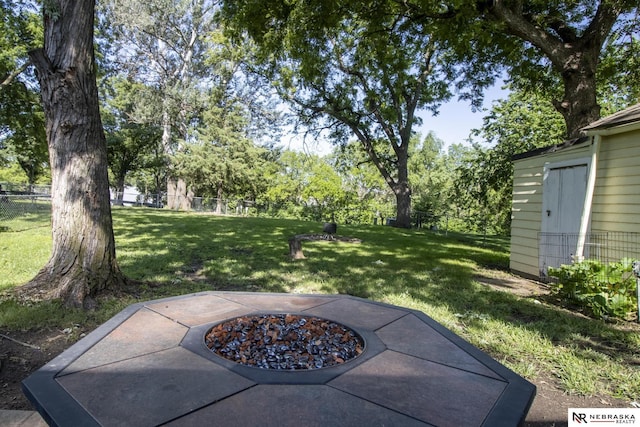1757 N Linden St, Wahoo, NE 68066 - view of yard with a fire pit, a patio, and view of scattered trees