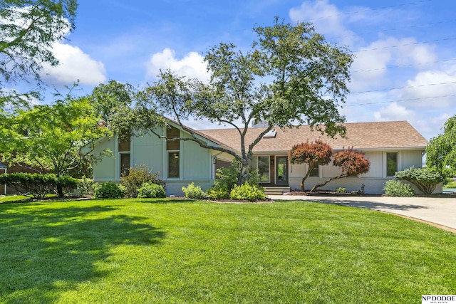 12328 Rose Ln, Omaha, NE 68154 - view of front of home with a front yard and concrete driveway