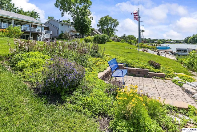 12328 Rose Ln, Omaha, NE 68154 - view of green lawn with a patio