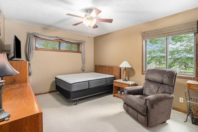 2219 Independence Dr, Lincoln, NE 68521 - bedroom with light colored carpet and a ceiling fan