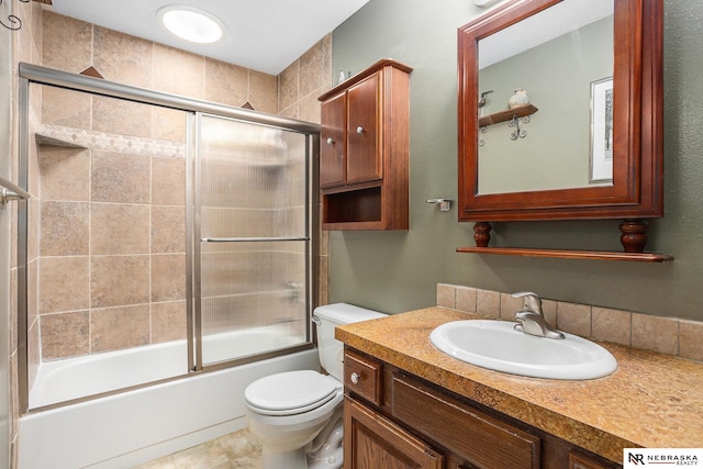 2219 Independence Dr, Lincoln, NE 68521 - full bath featuring vanity and shower / bath combination with glass door