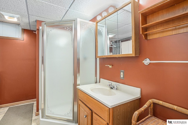 2219 Independence Dr, Lincoln, NE 68521 - full bath with a paneled ceiling, a stall shower, and vanity