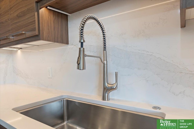 200 S 31st Ave Unit 4209, Omaha, NE 68131 - kitchen view of light countertops and tasteful backsplash