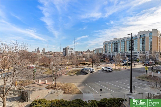 200 S 31st Ave Unit 4209, Omaha, NE 68131 - view of asphalt road featuring sidewalks, curbs, and a view of city