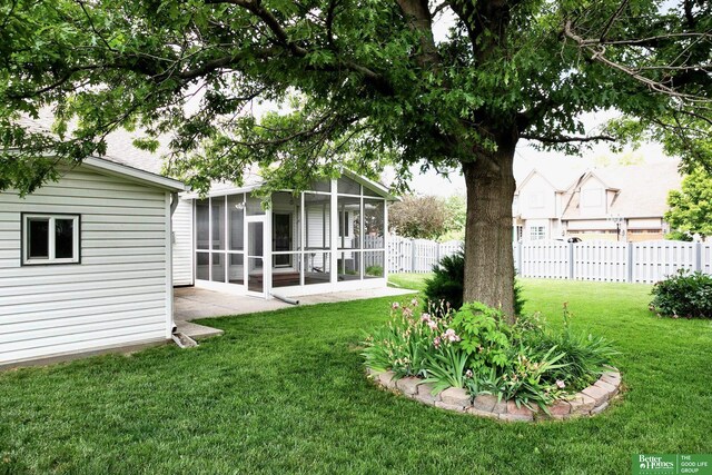 16140 Josephine St, Omaha, NE 68136 - view of yard featuring a sunroom