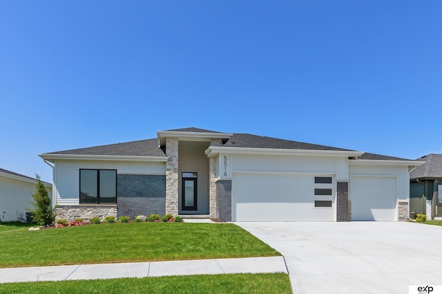 5516 N 208th Ave, Omaha, NE 68022 - prairie-style home featuring stone siding, a garage, driveway, and a front lawn