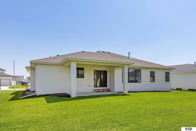 5516 N 208th Ave, Omaha, NE 68022 - back of property featuring a lawn and a shingled roof