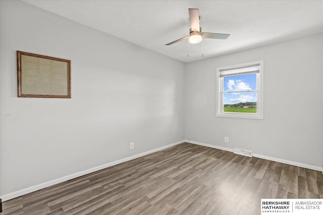 301 Gladys Ave, Yutan, NE 68073 - empty room featuring wood finished floors and a ceiling fan