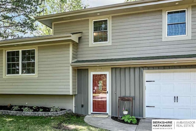 301 Gladys Ave, Yutan, NE 68073 - doorway to property with board and batten siding