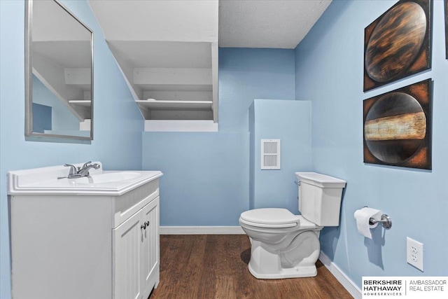 301 Gladys Ave, Yutan, NE 68073 - bathroom with vanity and wood finished floors