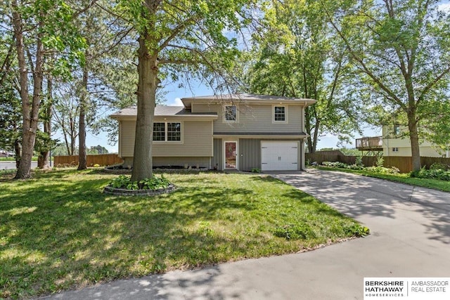 301 Gladys Ave, Yutan, NE 68073 - tri-level home with a garage and driveway