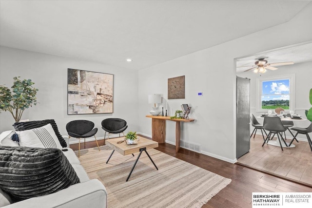 301 Gladys Ave, Yutan, NE 68073 - living area featuring wood finished floors, ceiling fan, and recessed lighting