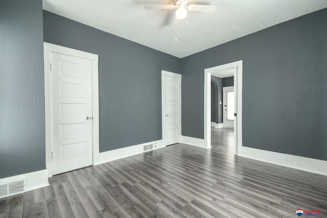 603 E Maple St, Sutton, NE 68979 - unfurnished room featuring ceiling fan and dark wood-type flooring