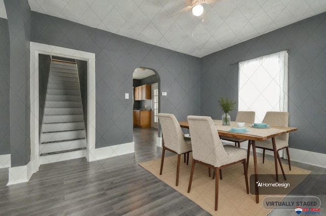 603 E Maple St, Sutton, NE 68979 - dining space featuring arched walkways and stairway