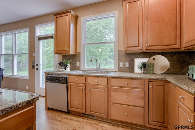 6732 S 169th Ave, Omaha, NE 68135 - kitchen with stainless steel dishwasher, light wood-style floors, and healthy amount of natural light