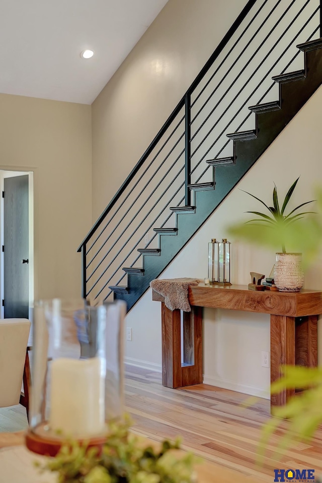 6833 Summerset Ct, Lincoln, NE 68516 - stairway with wood finished floors and recessed lighting