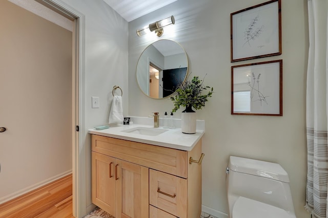 6833 Summerset Ct, Lincoln, NE 68516 - bathroom featuring vanity and wood finished floors