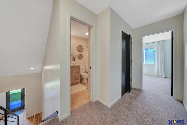 6833 Summerset Ct, Lincoln, NE 68516 - hall featuring light colored carpet and an upstairs landing