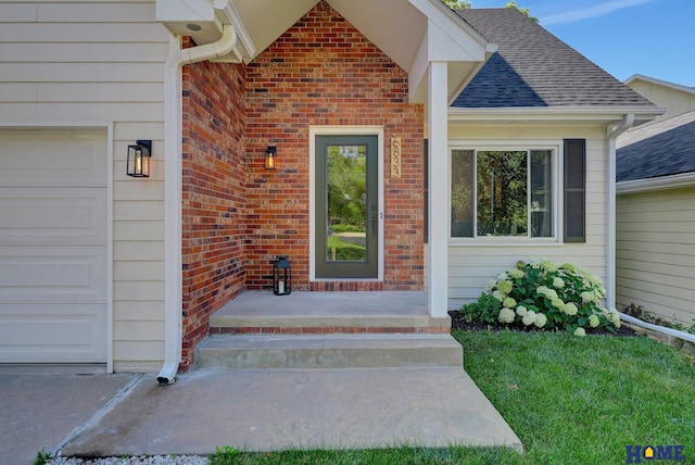 6833 Summerset Ct, Lincoln, NE 68516 - doorway to property with a garage, brick siding, and roof with shingles